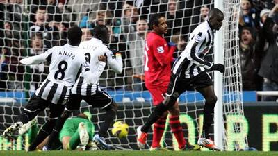Newcastle forward Demba Ba celebrates his goal against Wigan.