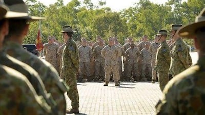 US Marines stand to attention with the 5th Battalion Royal Australian Regiment during an official welcome ceremony at Robertson Barracks, Darwin. The first detachment of marines arrived in Australia in April.