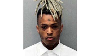 Rapper XXXtentacion was shot dead outside a motorcycle dealership in Florida on Monday, June 18, 2018. The Broward Sheriff's Office said the 20-year-old rising star was pronounced dead at a Fort Lauderdale-area hospital. Miami-Dade Corrections and Rehabilitation Department via AP