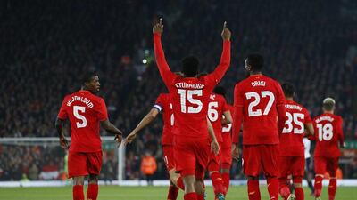 Liverpool’s Daniel Sturridge celebrates scoring their first goal with teammates. Jason Cairnduff / Action Images / Reuters
