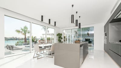 The kitchen has Miele appliances