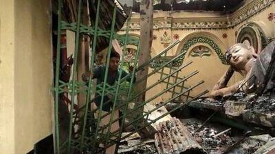 The burnt Buddhist temple of Shima Bihar at Ramu, some 350 kilometres southeast of the capital Dhaka. Witnesses described rioters leaving a trail of devastation in Buddhist villages.
