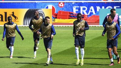 France players warm up during their team’s training session at the team base in Clairefontaine-en-Yvelines, France, 02 July 2016. France will face Iceland in the Uefa Euro 2016 quarter-final match in Saint-Denis on 03 July 2016. Georgi Licovski / EPA