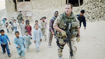 A Norwegian ISAF (International Security Assistance Force)soldier from Recce Squadron 3 patrols on October 4, 2004 in Kabul, Afghanistan as election officials get ready for the Presidential elections. Getty Images