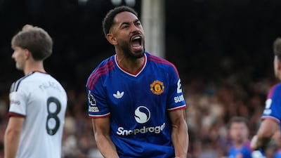 Manchester United's Matheus Cunha celebrates after his deflected shot made it 1-1 against Fulham. AFP