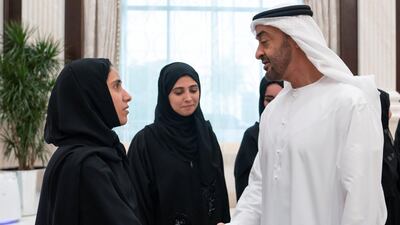 Sheikh Mohamed bin Zayed (right), greets a member of the Ministry of Presidential Affairs, during an iftar reception, at Abu Dhabi's Al Bateen Palace.
