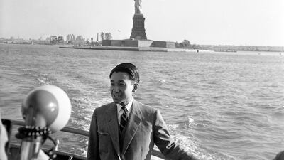 In this Oct. 1, 1960, file photo, Crown Prince Akihito is photographed while on a boat trip around Manhattan Island sight-seeing in New York. In the background is the Statue of Liberty. The Japanese royals were in New York as part of their state visit. When he abdicates April 30, 2019, Akihito will become the first emperor in Japan’s modern history to see his era end without ever having a war. AP