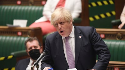 UK Prime Minister Boris Johnson won a key parliamentary vote on foreign aid on Tuesday. AP