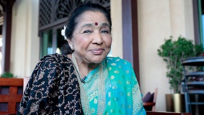 Asha Bhosle, seen here in Dubai in 2014, visited the UAE regularly for musical and culinary pursuits. Jeffrey E Biteng / The National