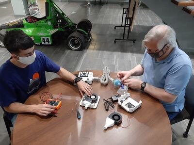 The team at the University of Leeds work on the prototype of a breathing device for Covid patients. University of Leeds