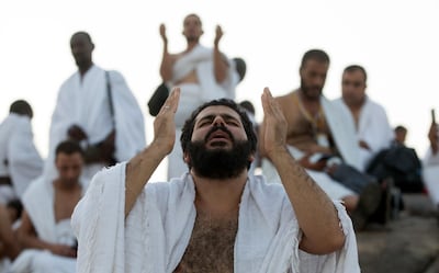 Muslim Hajj pilgrims pray during the Hajj pilgrimage at Mount Arafat. EPA/STR