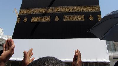 Muslim pilgrims pray in front of the Kaaba ahead of Hajj in Makkah, Saudi Arabia. AP