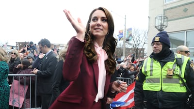 The Princess of Wales waves as she leaves after a visit to Roca