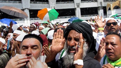 Muslim pilgrims pray as they circumambulate around the Kaaba, the cubic building at the Grand Mosque, in Makkah, Saudi Arabia. AP