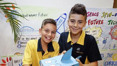 From left, Gems National Academy pupils Jad and Ryan, both 11, at the What Works Future initiative on Monday, part of Dubai’s Knowledge and Human Development Authority’s overall plan to provide a more complete education. Chris Whiteoak for The National
