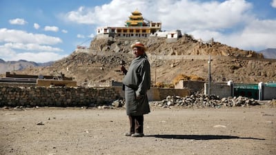 Dorsey Takapa, 65, a retired goat herder poses for a photograph in Choklamsar. When asked how living in the worlds fastest growing major economy had affected life, Takapa replied: "Traditional values are being lost as we focus on money."