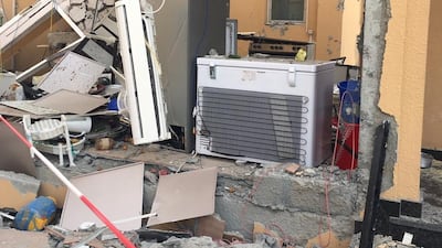 A woman is injured after the outside kitchen of a house in Al Ruqayeb explodes due to a gas leak. Courtesy Ajman Civil Defence