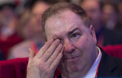 A man cries as US President Donald Trump speaks during the 2018 Conservative Political Action Conference. Saul Loeb/ AFP Photo