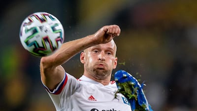 Toni Leistner of Hamburg fought with fans after the German Cup match against Dynamo Dresden. Getty