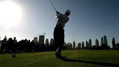 Tiger Woods tees off on the 8th hole of Majlis course during the Dubai Desert Classic in 2008.