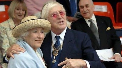 Vera Lynn and Jimmy Saville, right, attend the September 2005 unveiling of a sculpture at Victoria Embankment in central London to mark the 65th anniversary of the Battle of Britain.
