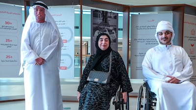 From left, Mohamed Alaydaroos, Noura Al Blooki and Hamad Al Hamadi at the launch event at Aldar Properties headquarters, on Yas Island. Victor Besa / The National