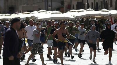 Russia fans pictured in Marseille running towards England fans. Violence between the two sets of supporters marred their Euro 2016 encounter. Carl Court / Getty Images