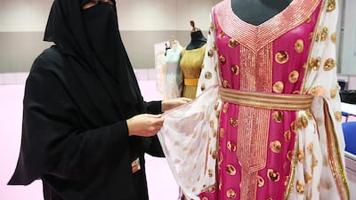 Shamma Al Daheri from Al Ain displays her creations at Adnec during the Emirates Skills exhibition held under the programme by Abu Dhabi’s Vocational Education and Training Institute. Fatima Al Marzooqi / The National
