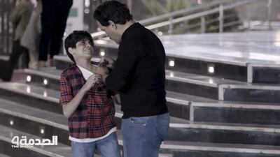 A scene from the TV show Al Sadma in Iraq shows a father, played by actor Mohammed Khader, grabbing his son, played by Hassan Mohammed. Some experts say hitting a child only teaches them how parents are unable to show restraint. Photo: MBC Iraq/screengrab