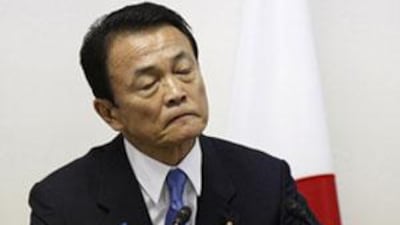 Japan's Prime Minister Taro Aso pauses while speaking to Liberal Democratic Party members during the party legislators' meeting at the LDP headquarters in Tokyo on July 21, 2009.