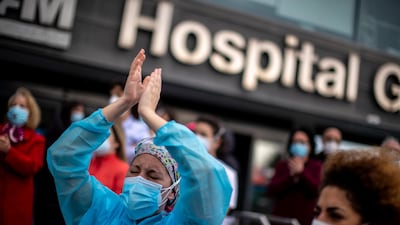 Healthcare workers protest against plans by Madrid's authorities to force staff to transfer to other hospitals at La Paz hospital in Madrid, Spain. AP Photo