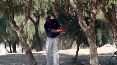 Darren Clarke of Northern Island hits a shot on the 13th hole during the second round of the Dubai Desert Classic golf tournament, January 31, 2009. REUTERS/Ahmed Jadallah (UNITED ARAB EMIRATES) *** Local Caption *** AJS07_GOLF-_0131_11.JPG