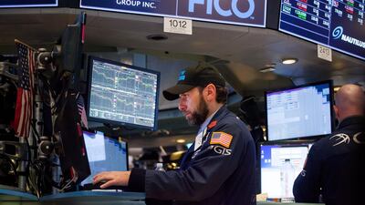 Despite lower valuations, continued earnings growth means equity markets and corporate bonds will continue to do well, with room to extend gains in 2018. Michael Nagle/Bloomberg