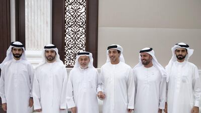 Sheikh Mohamed bin Hamad bin Tahnoon (second right), Sheikh Mansour bin Zayed , UAE Deputy Prime Minister and Minister of Presidential Affairs (third right) and Ahmed Mandi (fourth right) attend an iftar reception at Abu Dhabi's Al Bateen Palace.