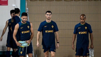 Goncalo Ramos, Cristiano Ronaldo and Joao Mario. AFP