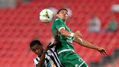 Al Jazira’s Basheer Saeed and Al Shabab’s Henrique Luvannor battle for the ball during an Arabian Gulf League match at Mohammed bin Zayed stadium in Abu Dhabi on May 1, 2015. Christopher Pike / The National