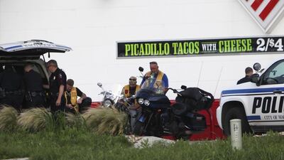 Three ‘biker gang members’ were arrested trying to enter the crime scene, said Waco police Sgt Patrick Swanto. John L Mone/AP Photo