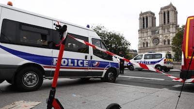 French police and security forces establish a security perimeter near Paris police headquarters. EPA