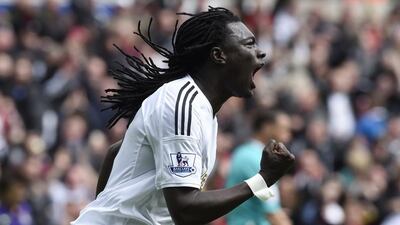 Bafetimbi Gomis celebrates scoring the second goal for Swansea. Rebecca Naden / Reuters