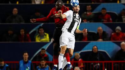 Juventus' Giorgio Chiellini challenges for a header with Manchester United striker Romelu Lukaku during the Champions League match in October, 2018. Reuters
