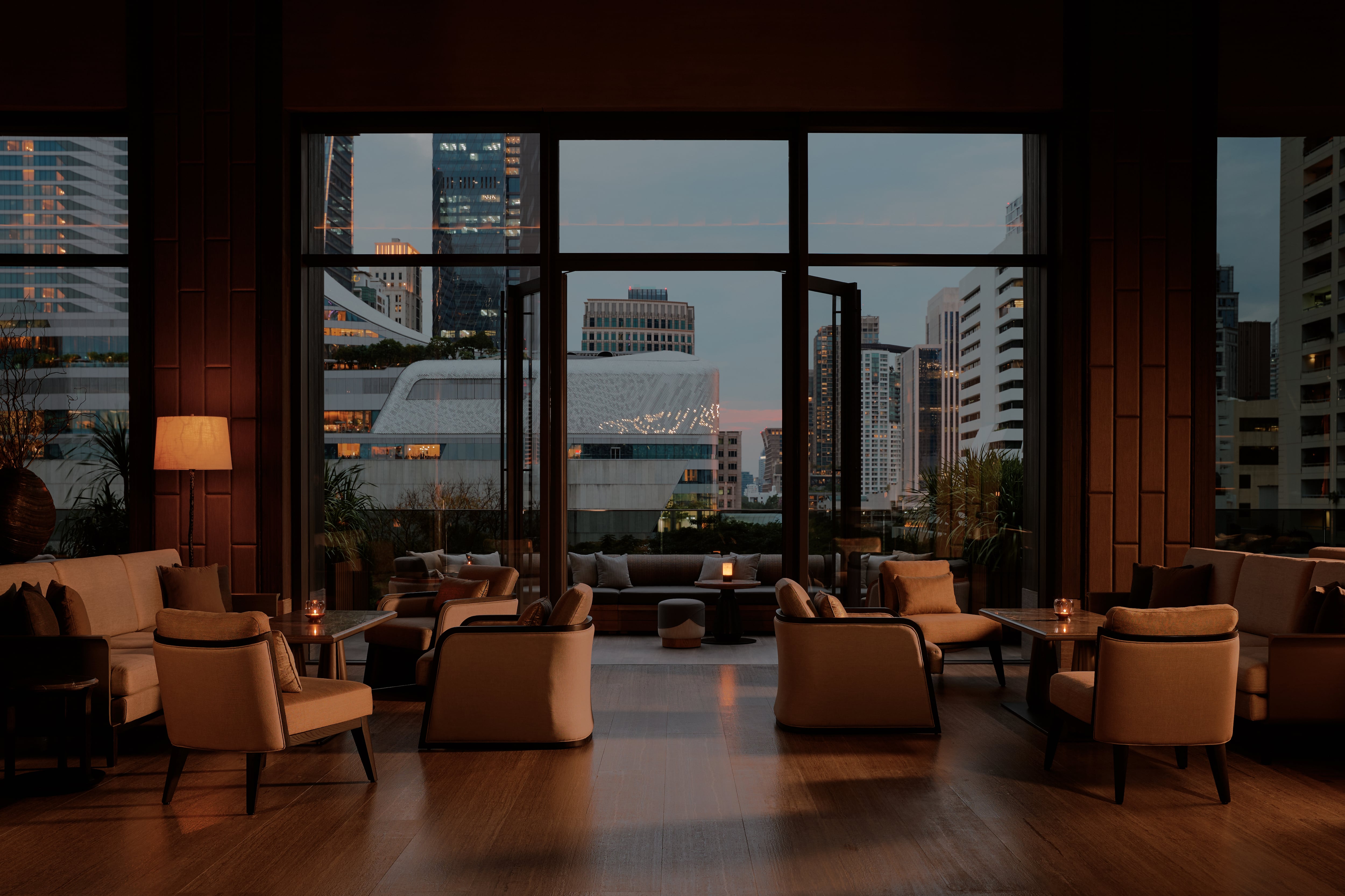 The lounge and terrace of the property's all-day dining restaurant 1872. Photo: Aman