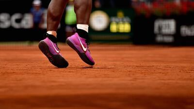 Serena Williams of the United States serves in her match against Christina Mchale of the United States oduring their match at the Italian Open. Dennis Grombkowski / Getty Images