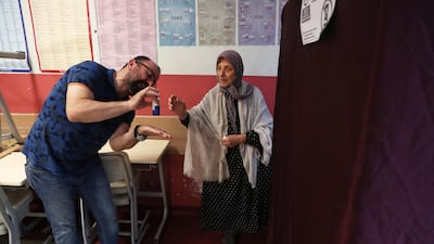 Turkish people cast their vote for the presidential and parliamentary elections in Istanbul, Turkey, on June 24, 2018. Srdjan Suki / EPA
