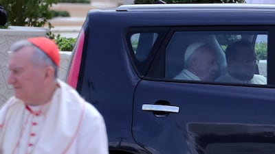 Pope Francis arrives at a welcome ceremony at the Presidential Palace in Abu Dhabi in a Kia Soul, accompanied by his personal secretary, Coptic Catholic priest Yoannis Lahzi Gaid. Reuters