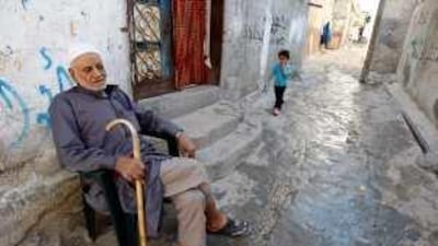 An elderly Palestinian sits outside his home in the southern Gaza Strip Rafah refugee camp.
