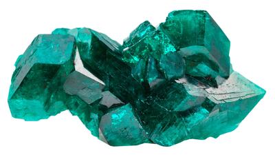 The deep green colour of dioptase crystals comes from its copper content.