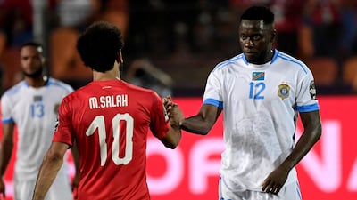 Egypt forward Mohamed Salah shakes hands with DR Congo defender Wilfred Moke after the match. AFP