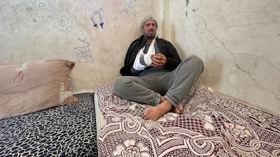 Talal Al Zaanin says he was shot in the arm and shoulder by Israeli troops shortly after being released. Mohammed Abo Doon for The National