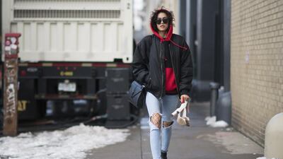 Alanna Arrington in the streets of Manhattan during New York Fashion Week. Timur Emek / Getty Images