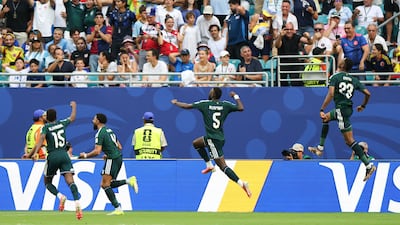 Mohamed Kanno after scoring his team's first goal during the match between Saudi Arabia and Uruguay at the Miami Stadium. AFP